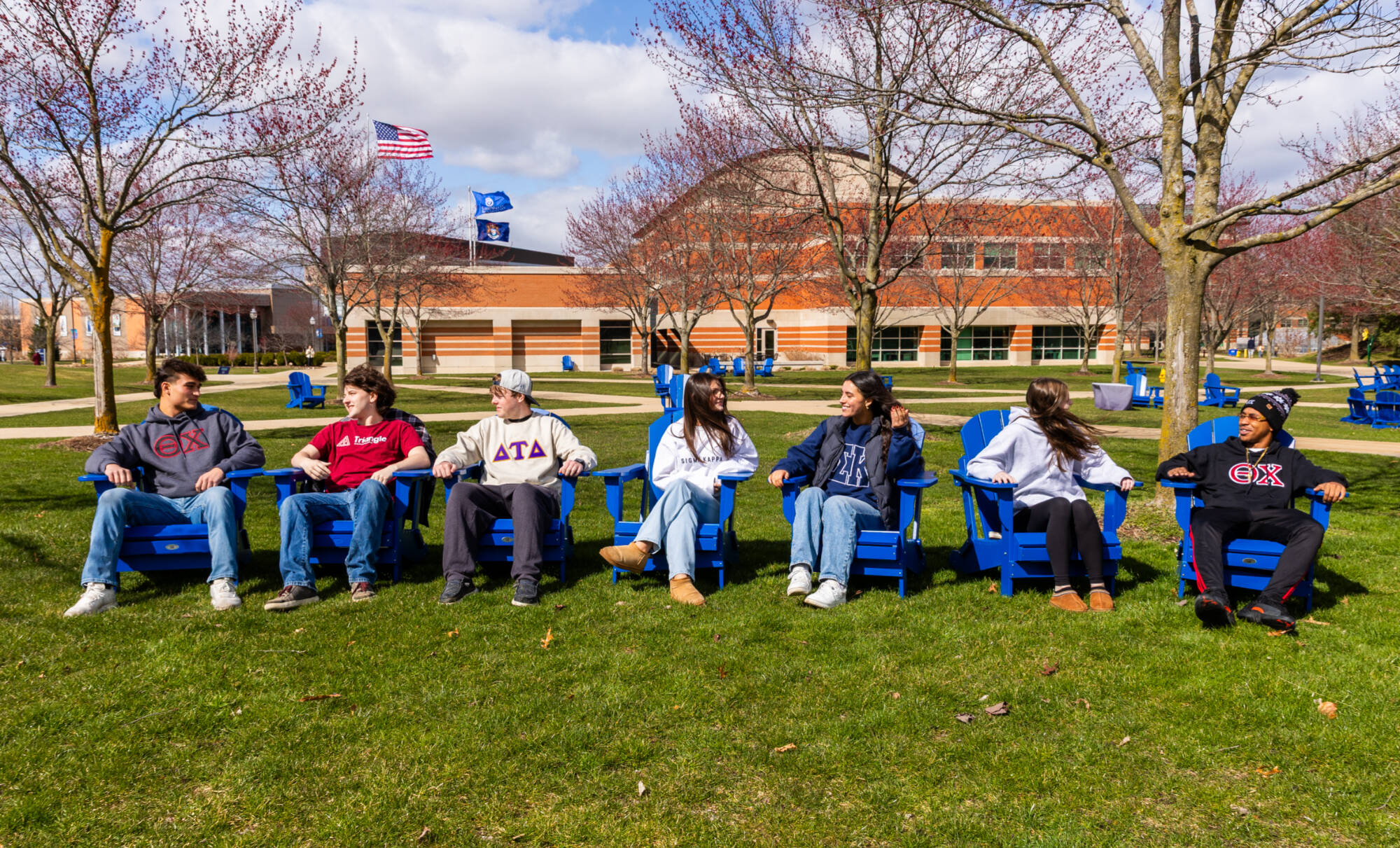 Group of students sitting on Kirkhof Lawn